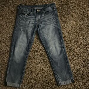 Size 12, blue ankle jeans made with 72% Cotton, 26  Polyester, 2% Elastane
